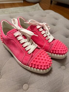 Christian Louboutin neon pink studded sneaker